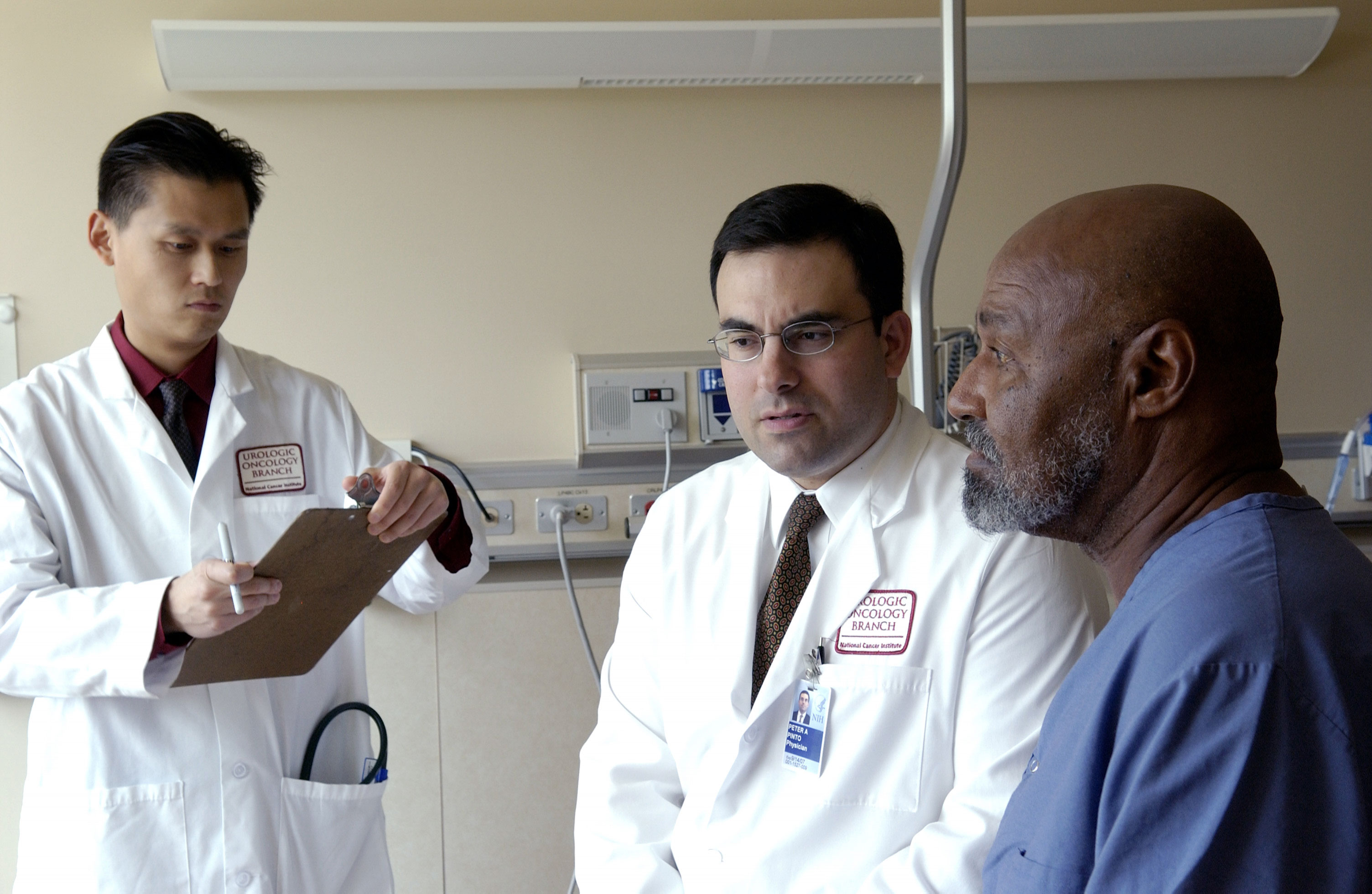 African American Patient with Doctors