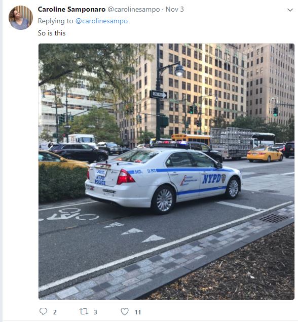 police car obstructing bike path creates additional risks of bicycle accidents