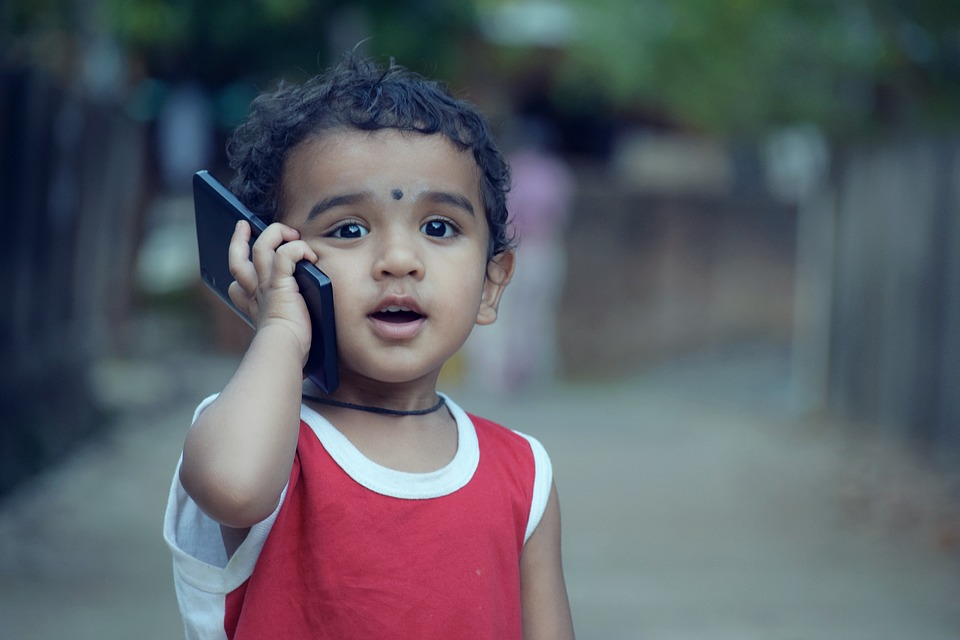 boy using cell phone